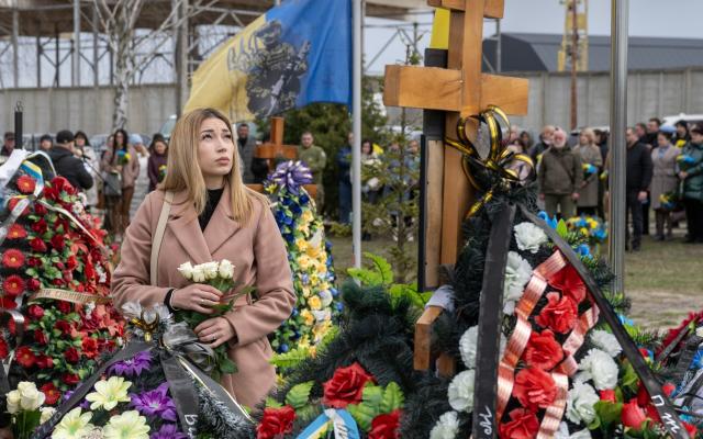 Nastia, a widow, in Bucha Cemetery on the 1st Anniversary of the liberation of Bucha from Russian occupation - Paul Grover/Paul Grover for the Telegraph