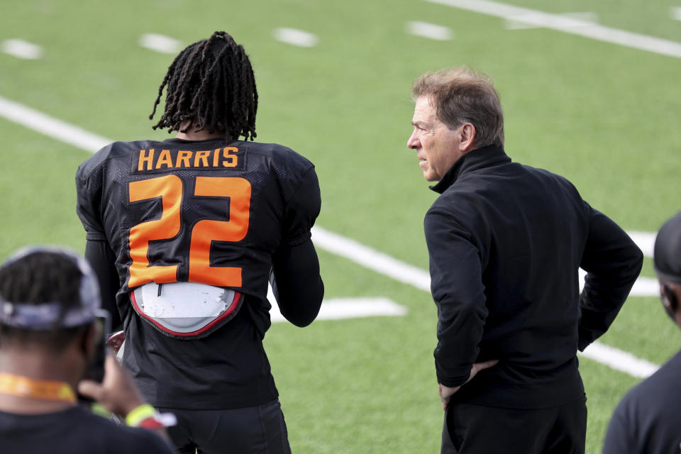 Najee Harris and Alabama head coach Nick Saban chat at the 2021 Senior Bowl. (AP Photo/Rusty Costanza)