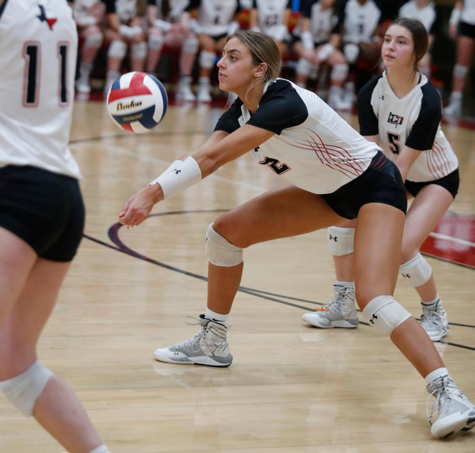 Lubbock-Cooper's Hope Douglass passes the ball against Colleyville Heritage in the Region I-5A semifinals volleyball match, Friday, Nov. 11, 2022, at Coronado High School.