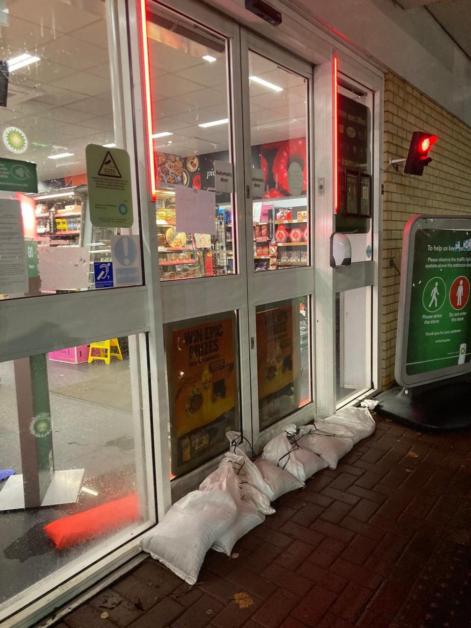 Sandbags placed outside a shop in Glasgow, Scotland (Twitter/Professor Larissa Naylor)