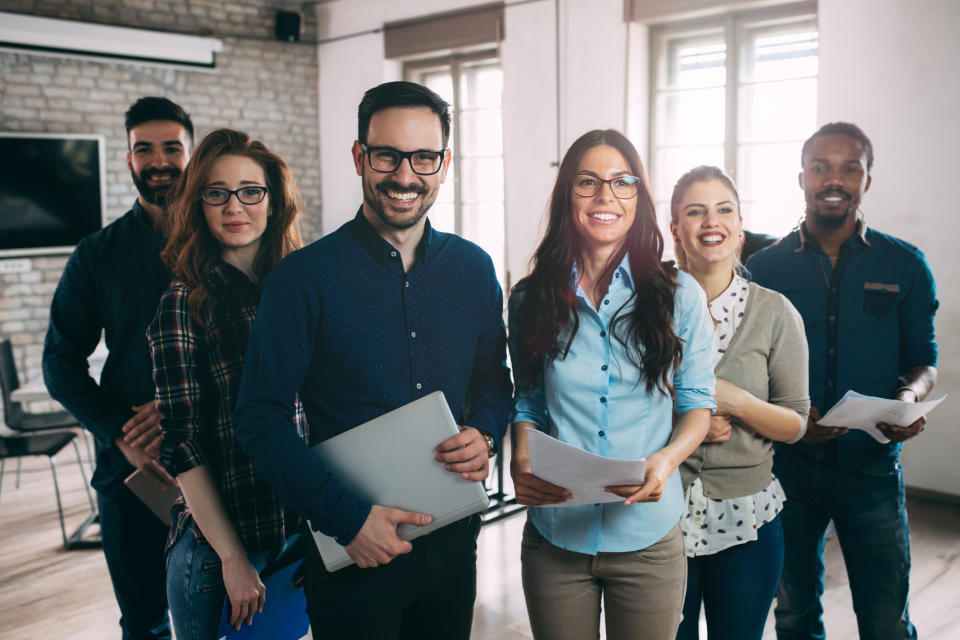 Team of office workers smiling