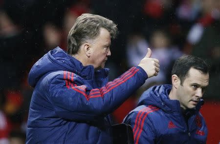 Football Soccer - Manchester United v Swansea City - Barclays Premier League - Old Trafford - 2/1/16 Manchester United manager Louis van Gaal celebrates at the end of the match Reuters / Andrew Yates Livepic