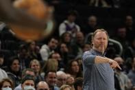 Milwaukee Bucks head coach Mike Budenholzer reacts during the first half of an NBA basketball game against the Cleveland Cavaliers Monday, Dec. 6, 2021, in Milwaukee. (AP Photo/Morry Gash)