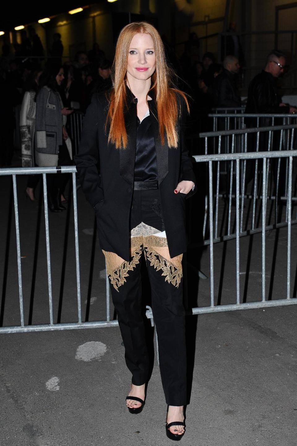 Actress Jessica Chastain arrives at Givenchy's Ready to Wear's Fall-Winter 2013-2014 fashion collection presented Sunday, March 3, 2013 in Paris. (AP Photo/Zacharie Scheurer)