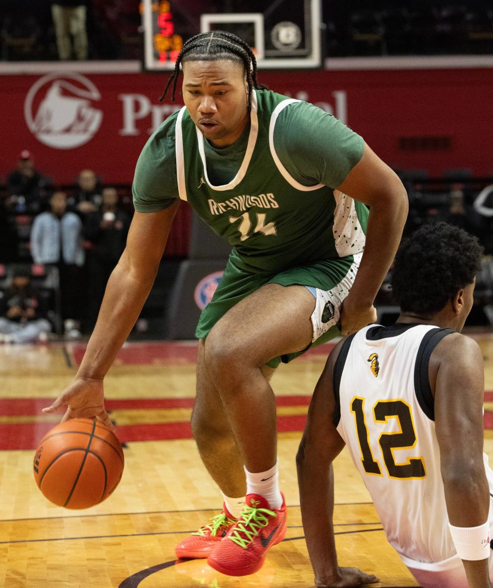 Latham Sommerville slips past the defense and shoots in first half action. Richwoods Knights vs College Achieve Knights of Asbury Park in The Battle basketball series at Rutgers on December 29, 2023.