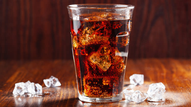 Coca-Cola glass over ice