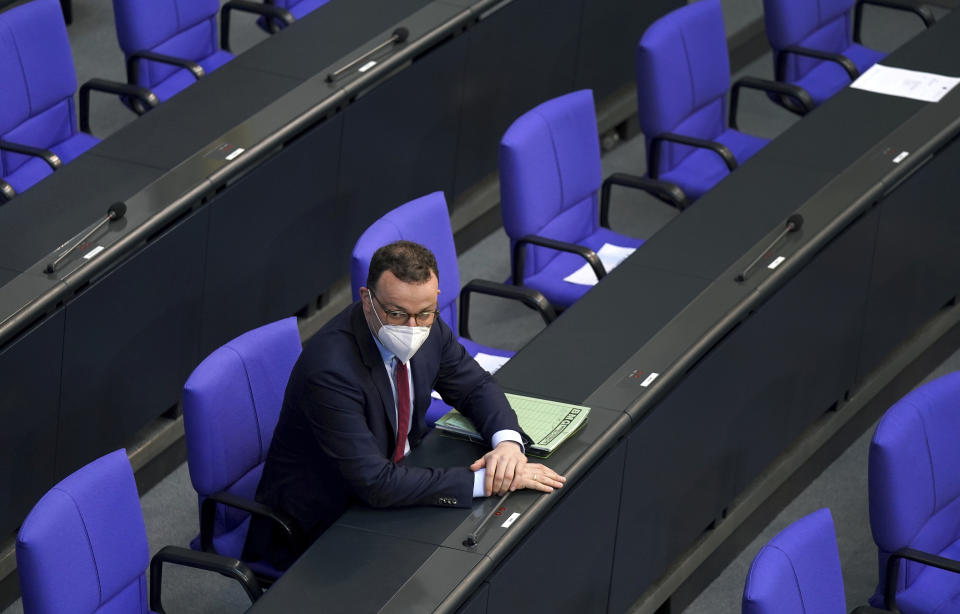 German Health Minister Jens Spahn attends a meeting of the German federal parliament, Bundestag, at the Reichstag building in Berlin, Germany, Wednesday, April 21, 2021. (AP Photo/Michael Sohn)