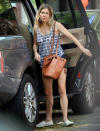 <p>Sienna Miller packs up her car on Sunday in New York City.</p>