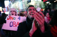 Supporters of President Barrack Obama celebrate in Times Square as television networks call the election in favor of President Barack Obama on November 6, 2012 in New York City. According to network projections incumbent U.S. President Barack Obama has won a second term. (Photo by John Moore/Getty Images)