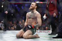 Conor McGregor smiles after defeating Donald "Cowboy" Cerrone during a UFC 246 welterweight mixed martial arts bout Saturday, Jan. 18, 2020, in Las Vegas. (AP Photo/John Locher)