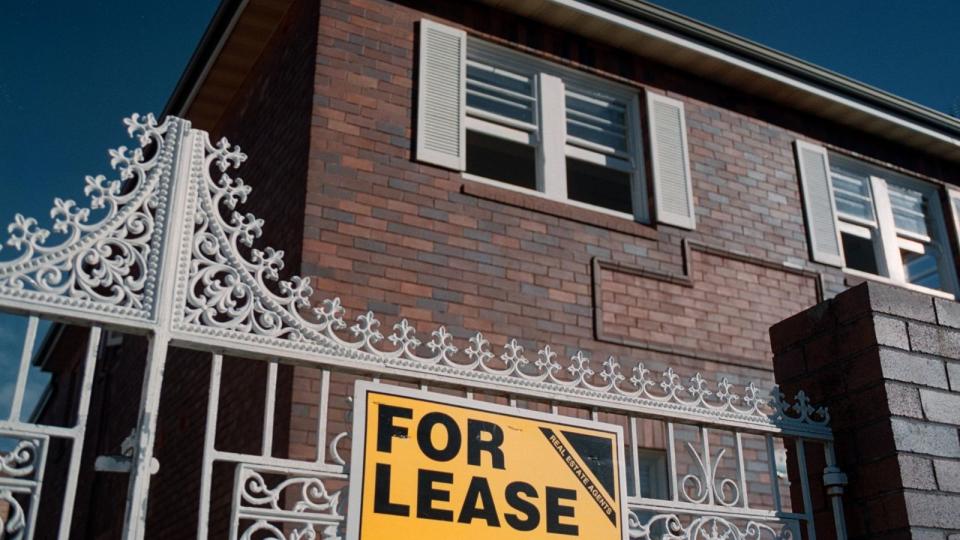 For lease sign outside apartment block