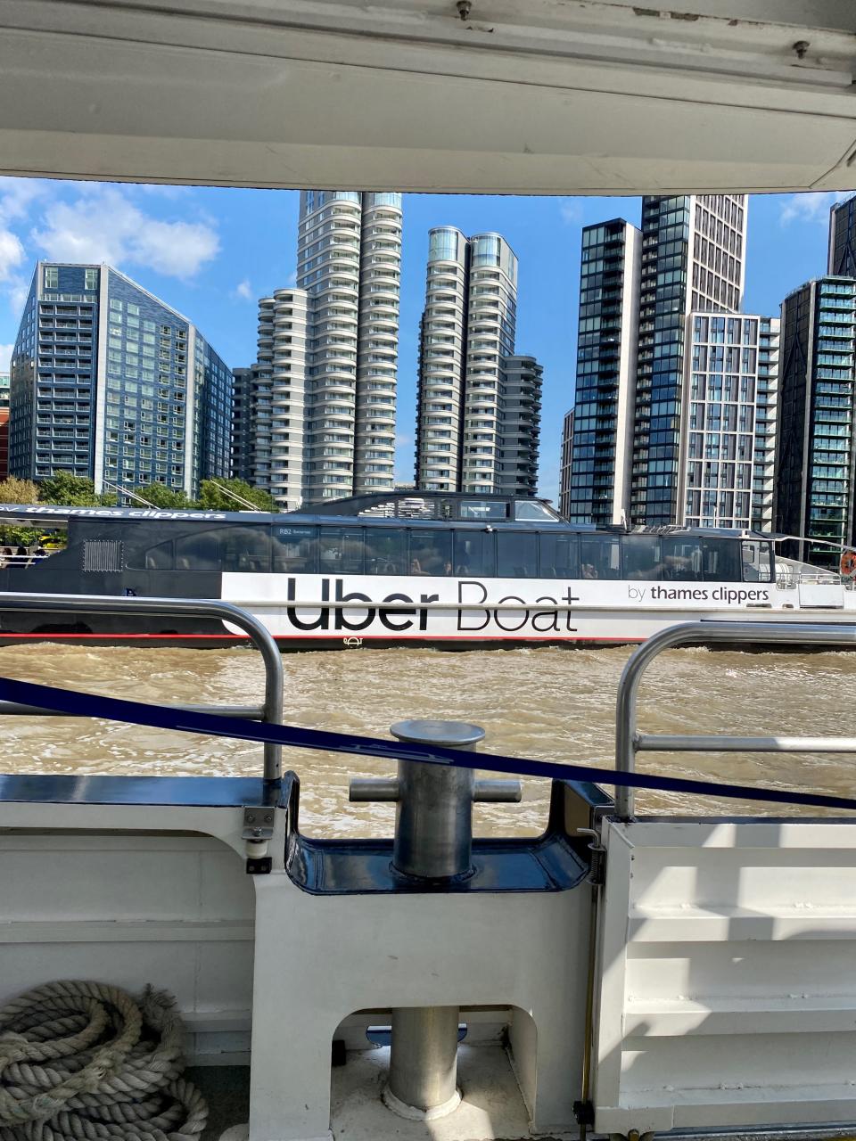 An Uber Boat passing by on the river