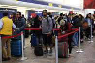 <p>Air travelers wait to check in during a winter nor’easter at LaGuardia Airport in New York, March 2, 2018. (Photo: Shannon Stapleton/Reuters) </p>