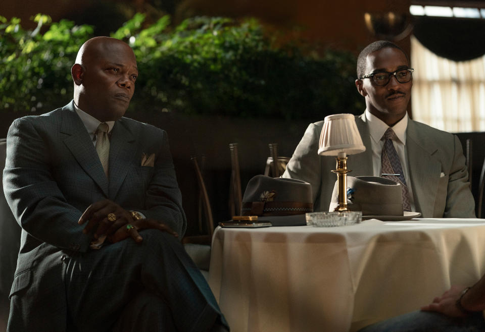 This image released by Apple TV Plus shows Samuel L. Jackson, left, and Anthony Mackie in a scene from "The Banker." (Apple TV Plus via AP)