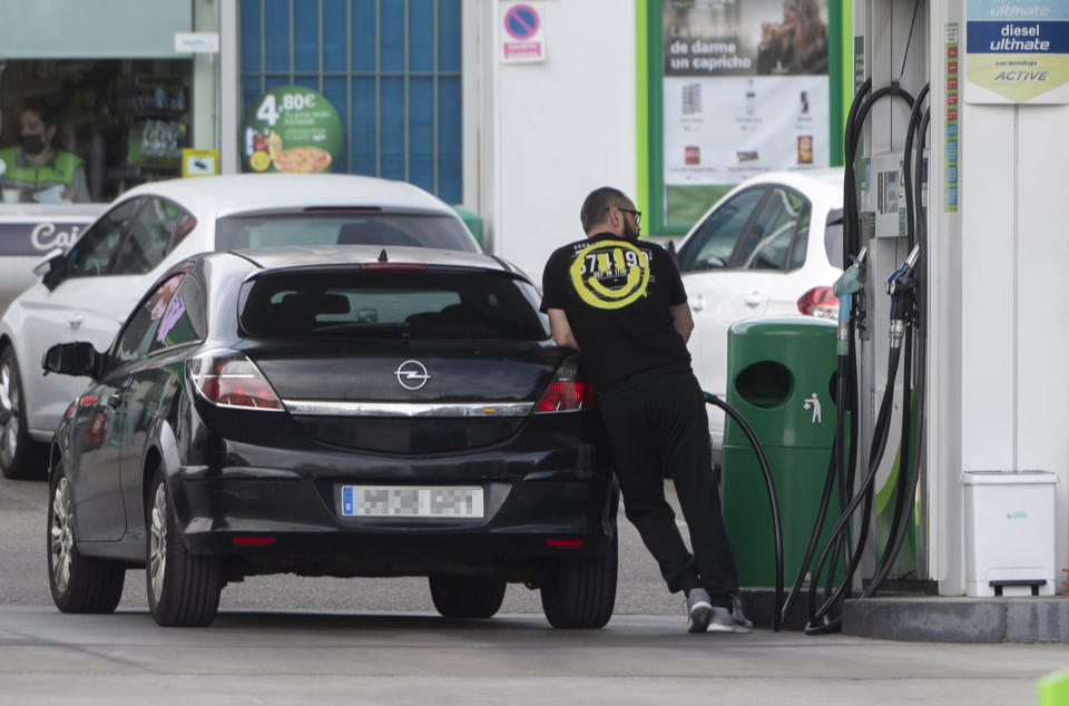 MADRID SPAIN, SPAIN - FEBRUARY 24: A person refuels at a gas station on February 24, 2022, in Madrid, Spain. The price of gasoline and diesel fuels set new all-time records this week for both fuels, driven by the rise in the price of oil, which is already trading above the $100 per barrel mark following the start of Russia's attacks on Ukraine. (Photo By Alberto Ortega/Europa Press via Getty Images)