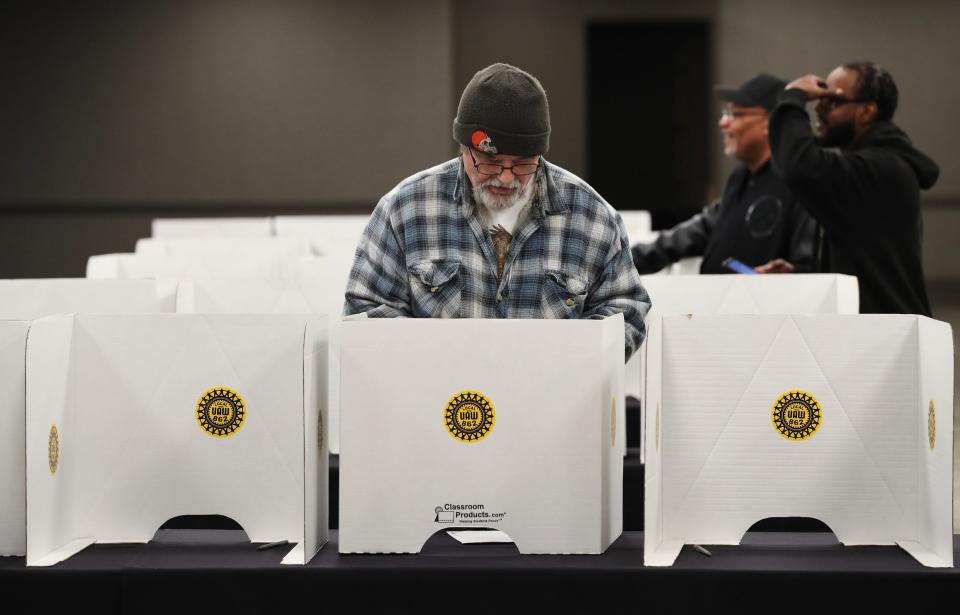 UAW Local 862 members cast their ballots on the vote to ratify a Ford contract at the Galt House in Louisville, Ky. on Nov. 12, 2023.