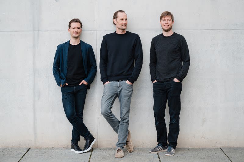 Founders of the E-bike subscription service Dance pose in this handout photo in Berlin