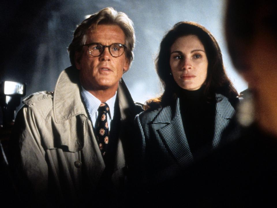 Nick Nolte standing next to Julia Roberts