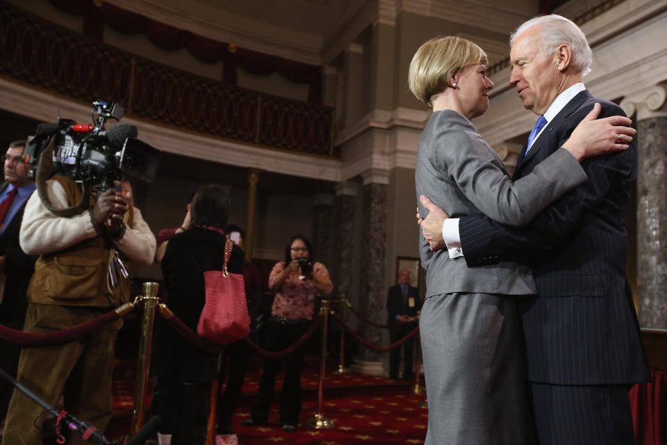 Sen. Tammy Baldwin (D-WI) (L) and then Vice President Joe Biden (R), on Jan. 3, 2013.