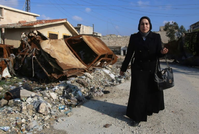 Kafa Jawish returns to her home in east Aleppo four years after leaving as rebels entered the city