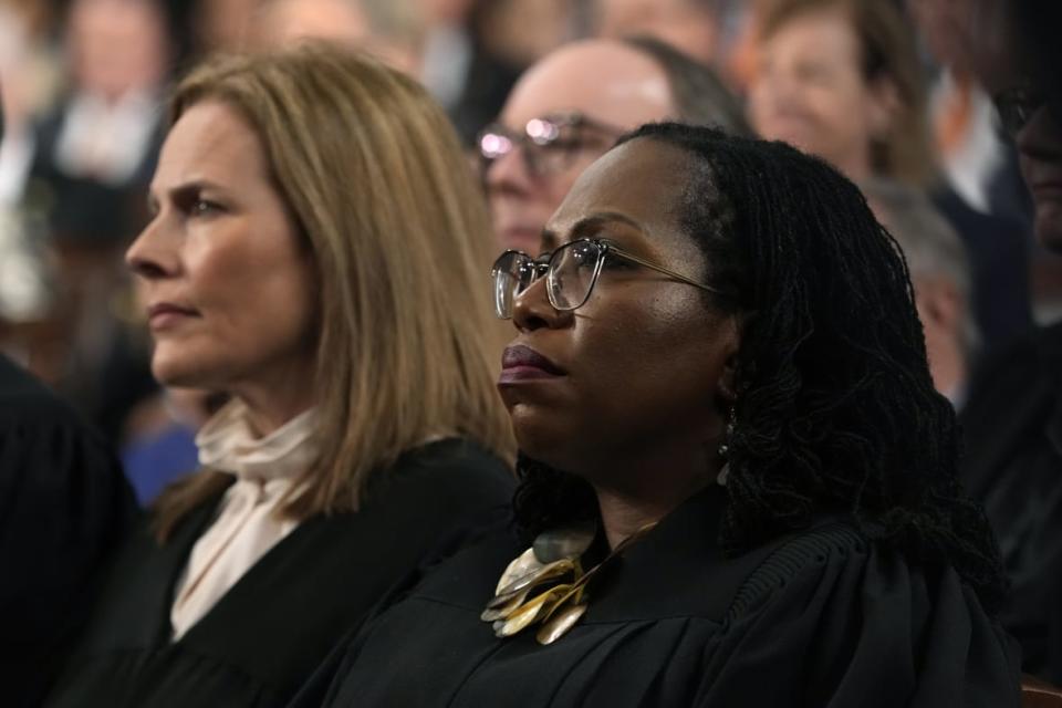 Supreme Court Justices Amy Coney Barrett and Ketanji Brown Jackson listen as President Joe Biden delivers the State of the Union address to a joint session of Congress on February 7, 2023 in the House Chamber of the U.S. Capitol in Washington, DC. (Photo by Jacquelyn Martin-Pool/Getty Images)