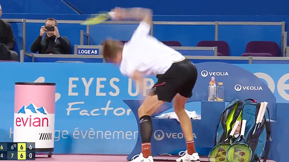 Alexander Bublik (pictured) smashes a racquet.