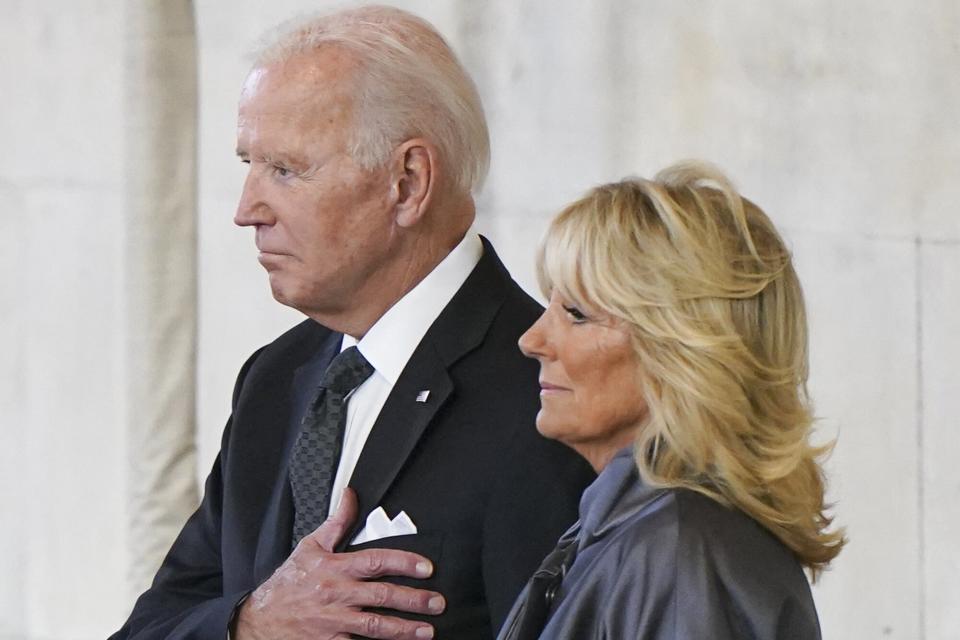 US President Joe Biden and First Lady Jill Biden pay their respects as they view the coffin of Queen Elizabeth II, as it Lies in State inside Westminster Hall, at the Palace of Westminster in London on September 18, 2022