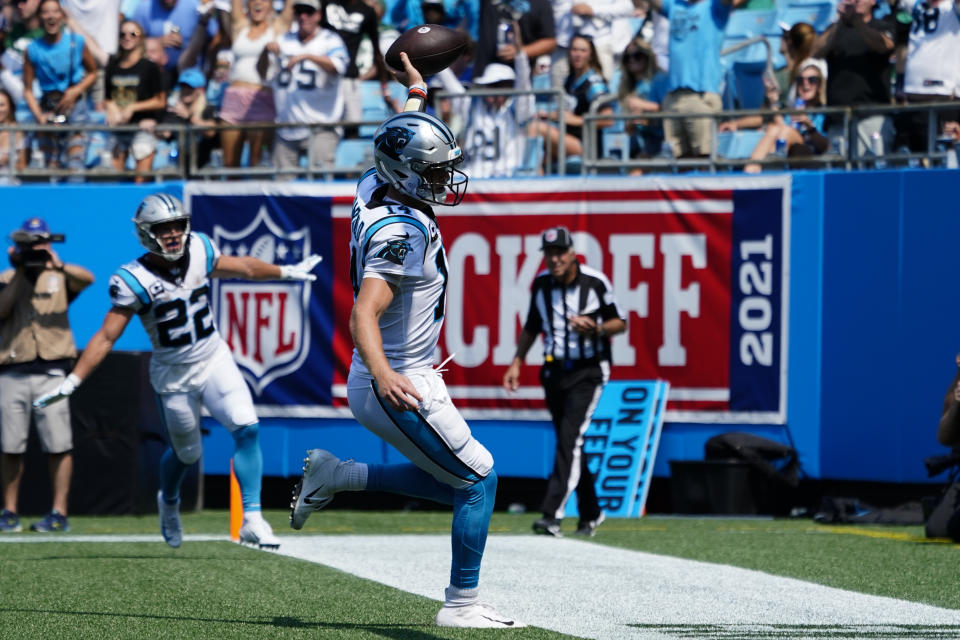 Carolina Panthers quarterback Sam Darnold celebrates after scoring against the New York Jets during the first half of an NFL football game Sunday, Sept. 12, 2021, in Charlotte, N.C. (AP Photo/Jacob Kupferman)