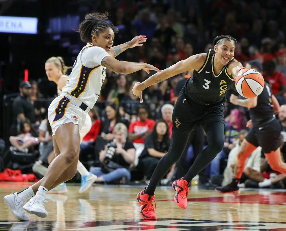 Candace Parker #3 of the Las Vegas Aces  reaches for the ball in the second quarter of their game at Michelob ULTRA Arena on June 24, 2023 in Las Vegas, Nevada. The Aces defeated the Fever 101-88.