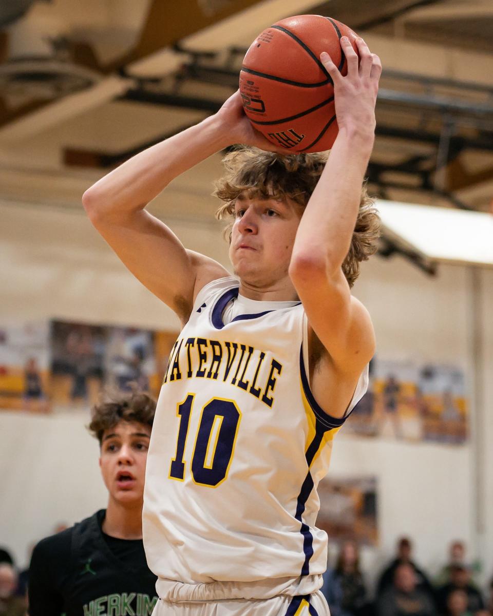 Waterville's Jackson Ruane passes the ball during the quarterfinal of the 2022-23 Section III Class C Section Championships at Waterville High School in Waterville, NY on Thursday, February 23, 2023.