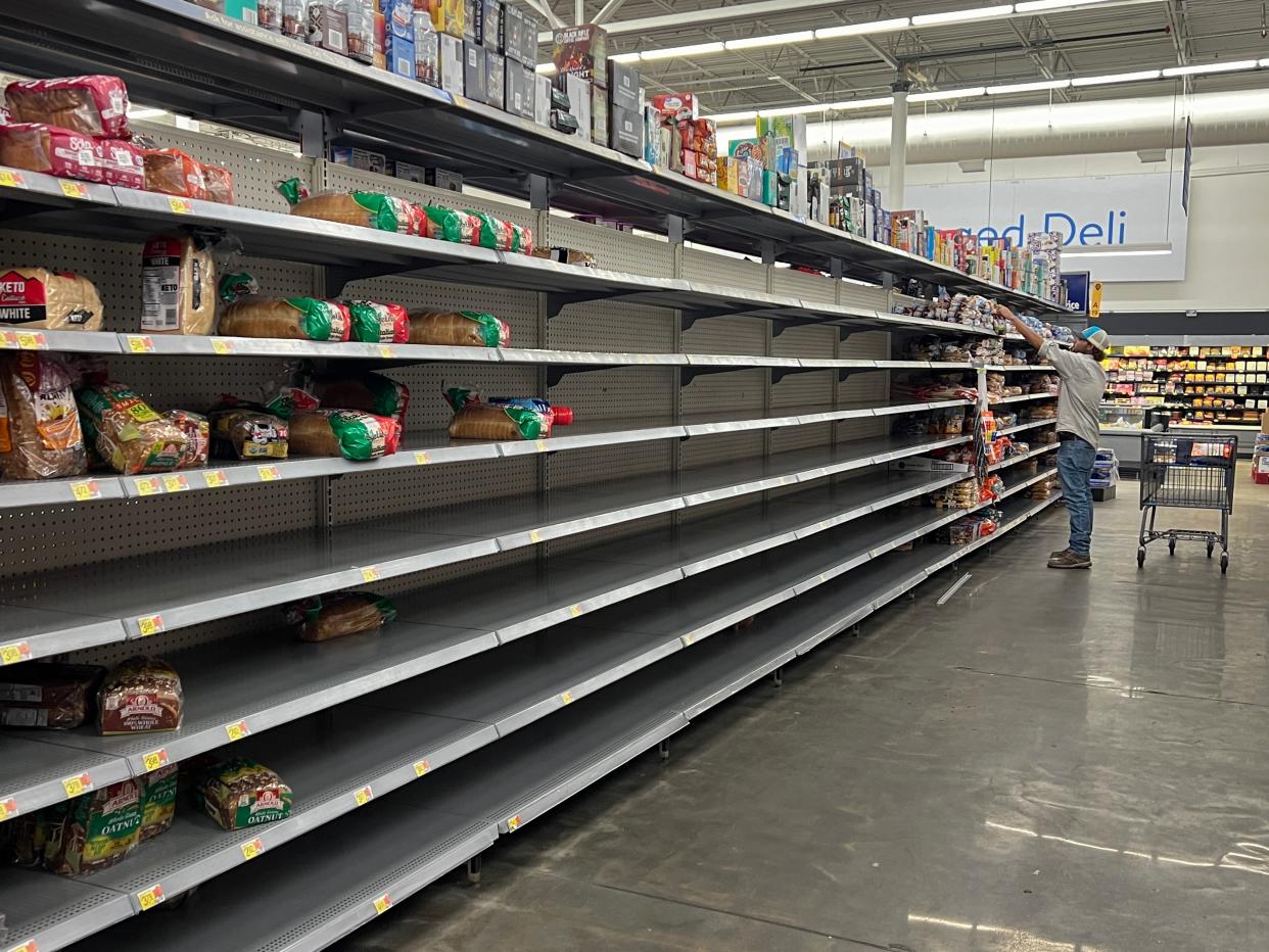 A bread aisle is almost bare in a Walmart store as people stock up before the possible arrival of storm Debby in Cedar Key, Florida (Getty Images)