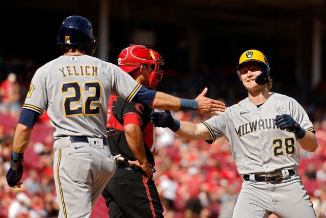 The Milwaukee Brewers score two runs on a pair of fielder's choice