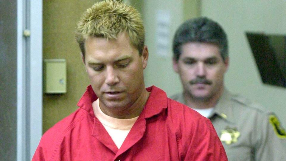 Scott Peterson is led into Stanislaus County Superior Court for arraignment in the deaths of his wife Laci Peterson and unborn son, Conner, April 21, 2003 in Modesto, California.
