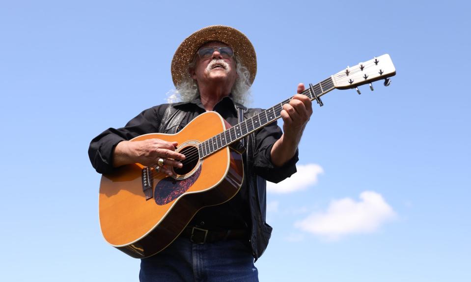 Legendary folk singer Arlo Guthrie sings Bob Dylan's 'The Times Are a Changin' on festival field during Woodstock 50th anniversary celebration at Bethel Woods Center for the Arts in Bethel on Thursday, August 15, 2019.