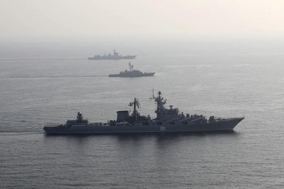 In this photo provided Friday, Jan. 21, 2022, by the Iranian Army, warships attend a joint naval drill of Iran, Russia and China in the Indian Ocean. Iran's state TV said 11 of its vessels were joined by three Russian ships including a destroyer, and two Chinese vessels. Iran's Revolutionary Guard will also participate with smaller ships and helicopters. (Iranian Army via AP)