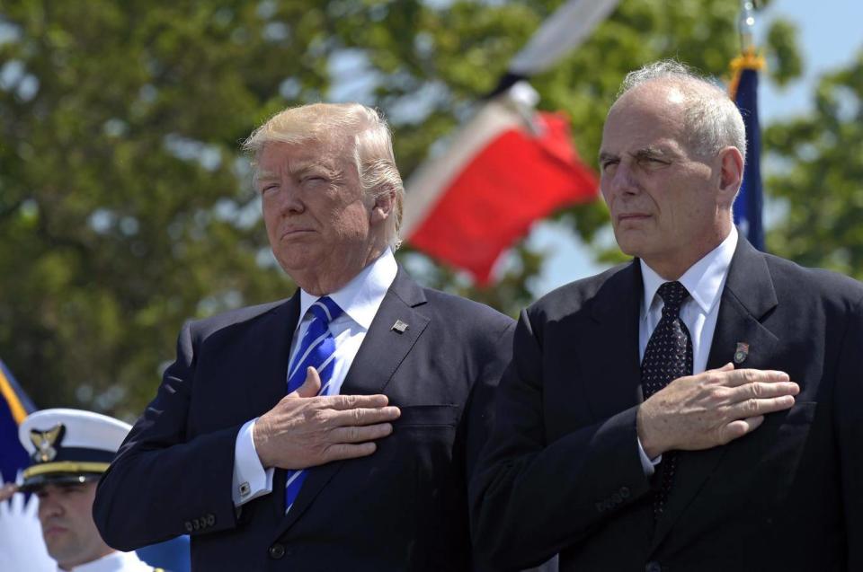The President and then Homeland Security Secretary listen to the national anthem in May(AP)