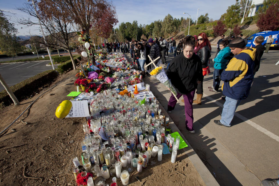 Thousands of flowers and moments left at the crash site. An informal street memorial for Paul Walker, key actor in the "Fast and Furious" film enterprise, and Roger Rodas, race car driver, who were both killed in a solo car auto accident in Valencia, CA. The memorial was held at the crash site, and featured several cars Paul Walker drove in the "Fast and Furious" films. Thousands of fans and car enthusiast showed up to pay their respects. (Photo by Ted Soqui/Corbis via Getty Images)