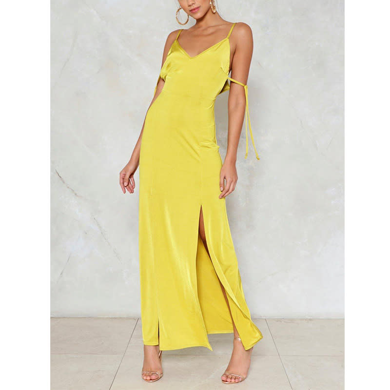 <p>This sunny maxi is giving us summer vibes and we're all for it. Stand out in the bright hue and wear it again once temperatures rise.</p> <p><a rel="nofollow noopener" href="https://click.linksynergy.com/deeplink?id=30KlfRmrMDo&mid=42490&murl=http%3A%2F%2Fwww.nastygal.com%2Flong-term-maxi-dress%2FAGG97058.html" target="_blank" data-ylk="slk:Nasty Gal Long-Term Maxi Dress;elm:context_link;itc:0;sec:content-canvas" class="link ">Nasty Gal Long-Term Maxi Dress</a>, $50</p>