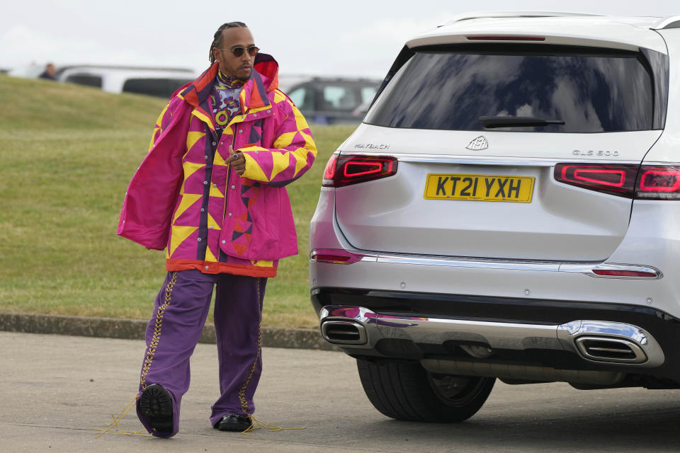 Mercedes driver Lewis Hamilton of Britain arrives at the Silverstone race track in Silverstone, Thursday, June 30, 2022. The British F1 Grand Prix is held on Sunday July 3,2022. (AP Photo/Frank Augstein)