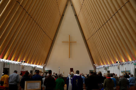 A service is held at a church for victims of the mosque shootings in Christchurch, New Zealand, March 17, 2019. REUTERS/Edgar Su