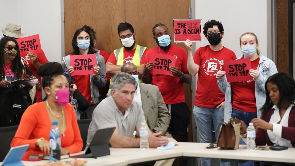 Protesters attended a meeting of the West End Opportunity Partnership Board at the West Louisville YMCA in Louisville, Ky. on April 25, 2022.  They are opposed to the West End tax increment financing (TIF) district that they fear will make their residences too expensive for the existing community.