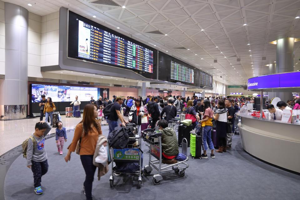 People wait at Taoyuan International Airport near Taipei, Taiwan. It is Taiwan's largest and busiest airport.