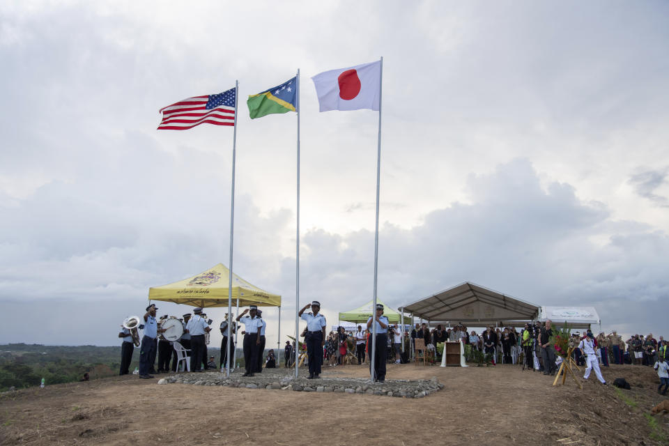 In this photo provided by the New Zealand Defence Force, a dawn service at Bloody Ridge is underway as part of commemorations to mark the 80th anniversary of the Battle of Guadalcanal near Honiara, Solomon Islands, Monday, Aug. 8, 2022. A Japanese sailor was attacked during the World War II memorial service that was also attended by U.S. Deputy Secretary of State Wendy Sherman. (Petty Officer Chris Weissenborn/NZDF via AP)