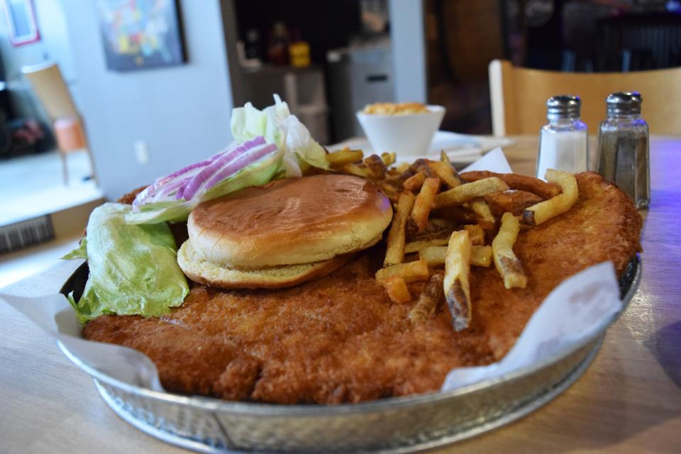At Ashers' new location in Pekin, customers will still be able to order the record size tenderloin. A smaller, "45" size will also be available to order.