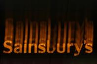 A Sainsbury's supermarket sign is seen in London January 6, 2015. REUTERS/Stefan Wermuth