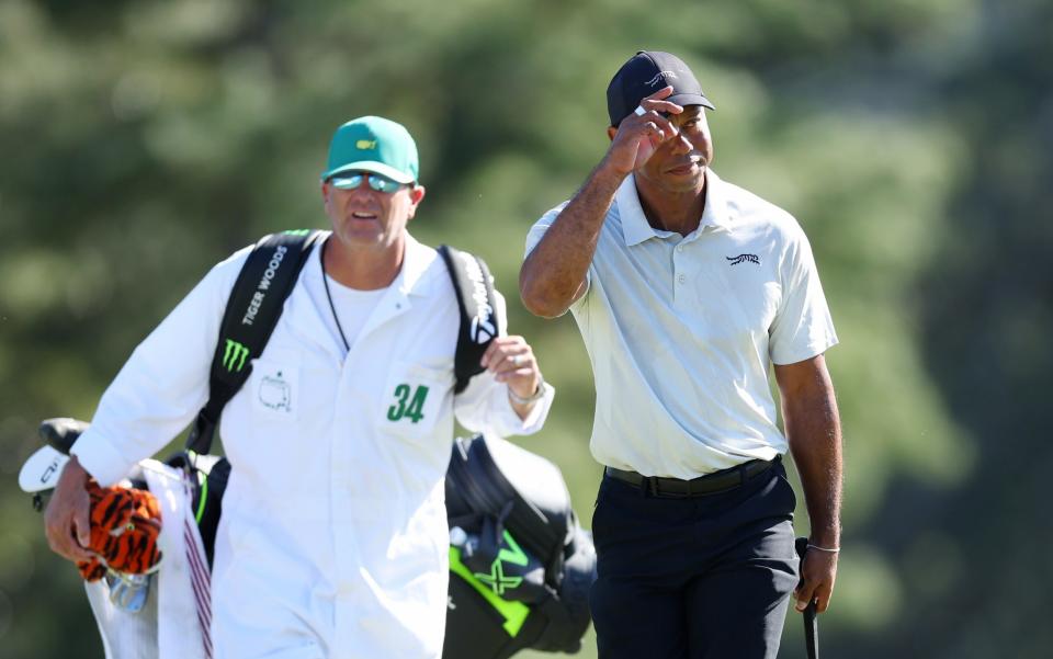 Tiger Wood acknowledges the crowd on the 18th