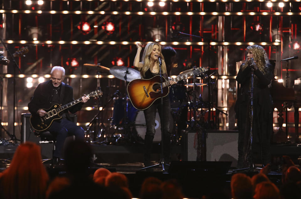Peter Frampton, from left, Sheryl Crow, and Stevie Nicks perform during the Rock & Roll Hall of Fame Induction Ceremony on Friday, Nov. 3, 2023, at Barclays Center in New York. (Photo by Andy Kropa/Invision/AP)