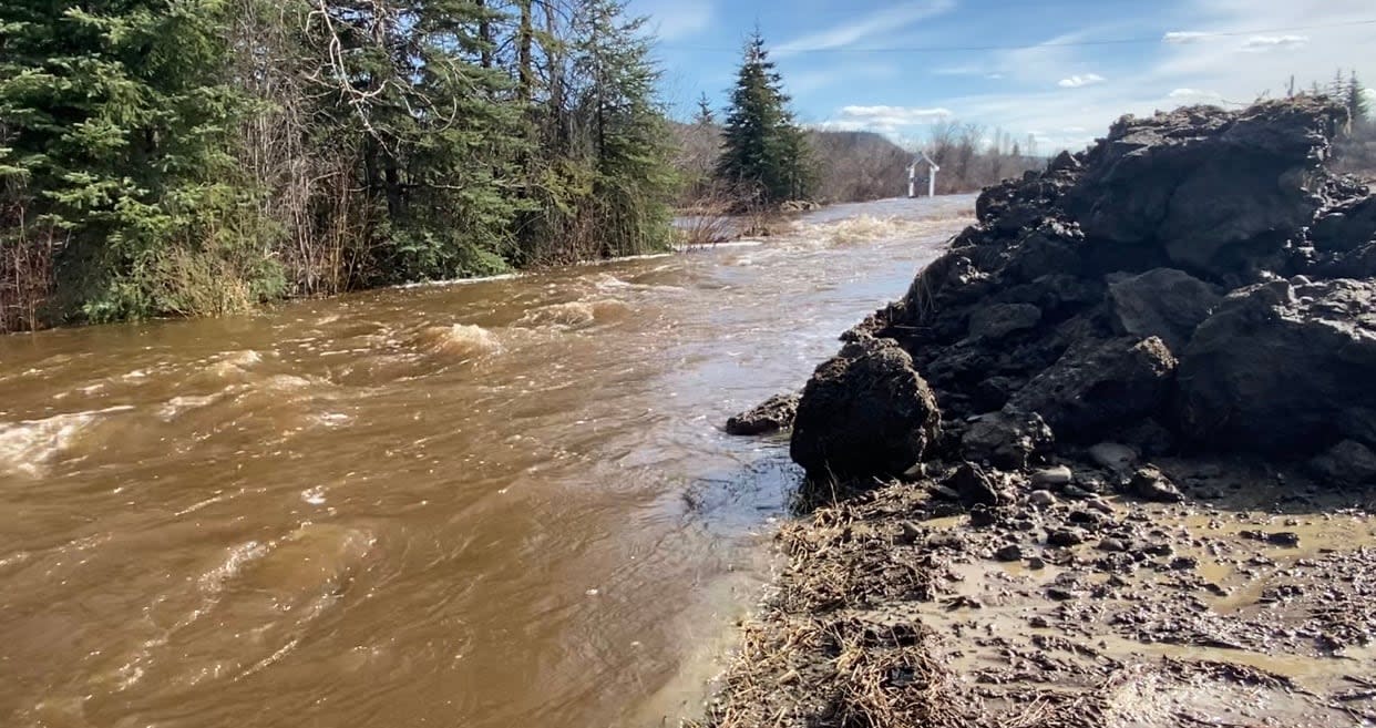Flood waters seen at Henderson Corner near Dawson City, Yukon, in May 2023. On Thursday, local emergency officials held a public information session for residents to hear about how they're preparing for any potential flooding again this spring. (Chris MacIntyre/CBC - image credit)