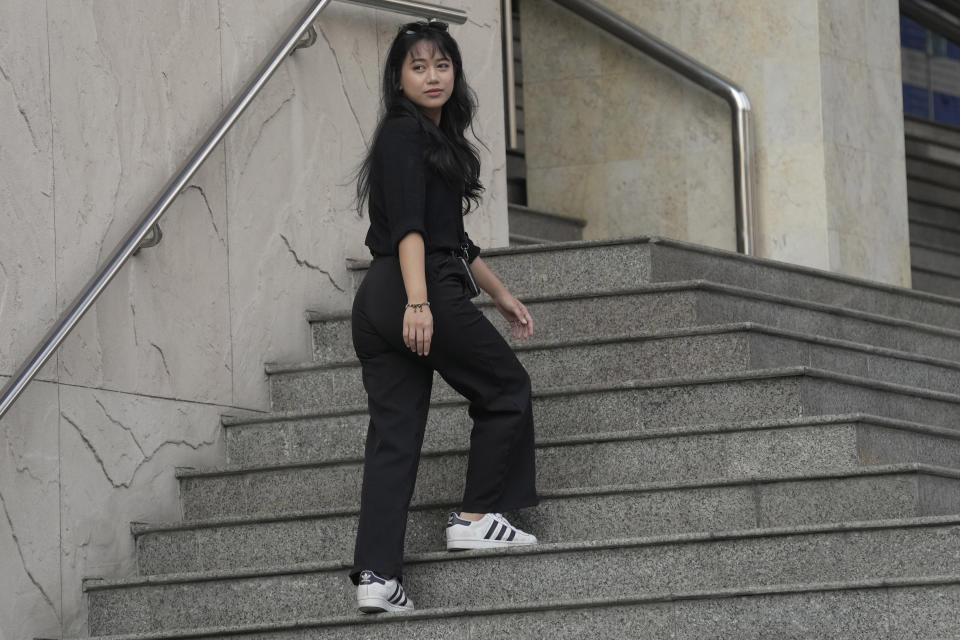 Patsaravalee Tanakitvibulpon walks into Southern Criminal Court in Bangkok, Thailand, Wednesday, Jan. 31, 2024. A Thai court on Wednesday convicted a prominent political activist of defaming the country’s monarchy and sentenced her to a two-year suspended jail term under a controversial law that criminalizes any perceived criticism of the royal institution. (AP Photo/Sakchai Lalit)