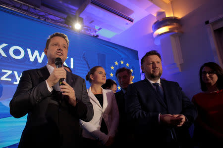 Rafal Trzaskowski, Civic Coalition candidate for mayor of Warsaw, speaks after the exit poll results of the Polish regional elections are announced in Warsaw, Poland October 21, 2018. Agencja Gazeta/Dawid Zuchowski via REUTERS